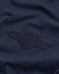 REGULAR TONAL SHIELD SS T-SHIRT EVENING BLUE / S