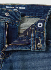 Jeans With Five Pockets And ''Sk8 & Spray” Print